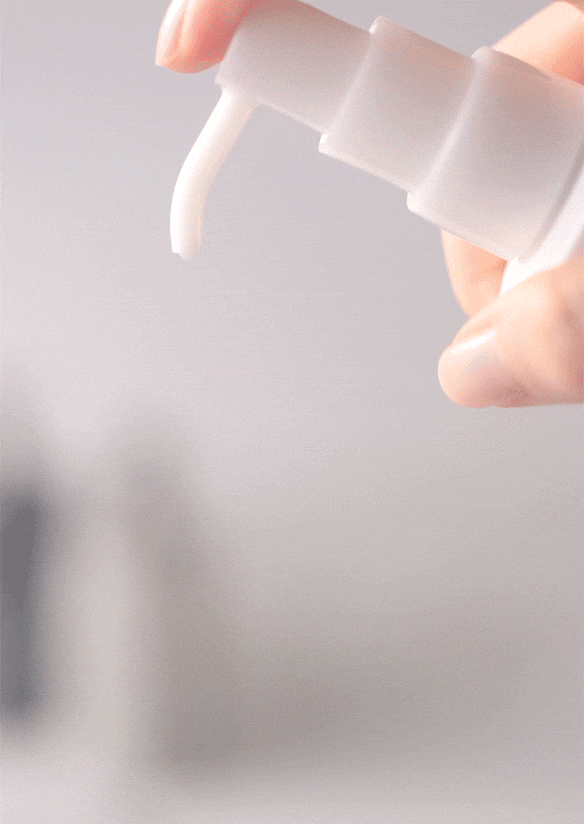 Creamy texture of a product being dispensed from a pump dispenser​