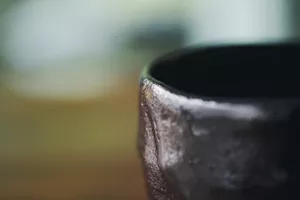 Japanese tea bowl placed on wooden floor